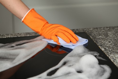 After builders cleaning team removing dust from a renovated Queens Park home