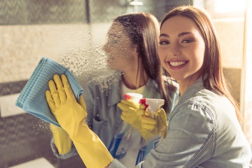 Local technician treating a pet accident stain in a Queens Park home