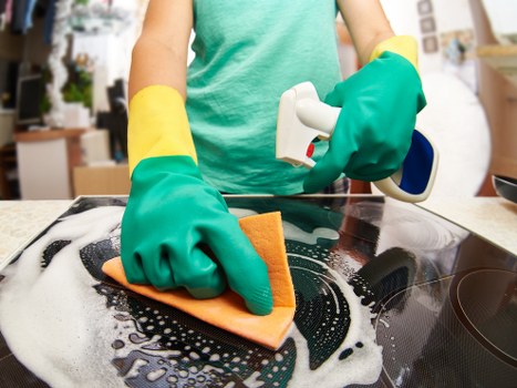 Local cleaning team preparing an Airbnb property in Queens Park for the next guest arrival